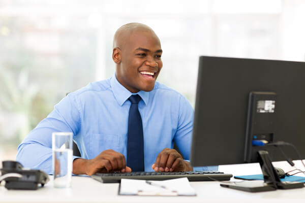 Business learner in front of a computer.