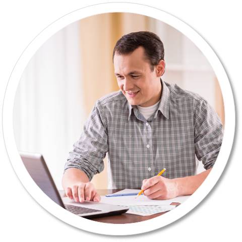 Student studying in front of a laptop.